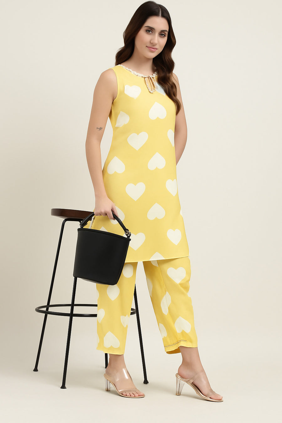 Women's yellow co-ord set with white heart print – sleeveless kurta and matching pants for summer wear