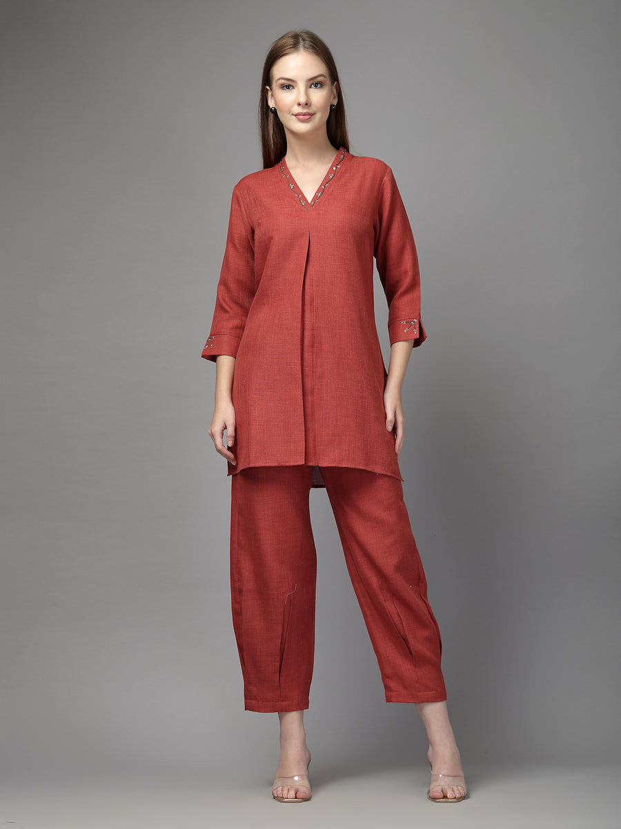Women's rust-colored solid co-ord set with V-neck kurta and tapered pants