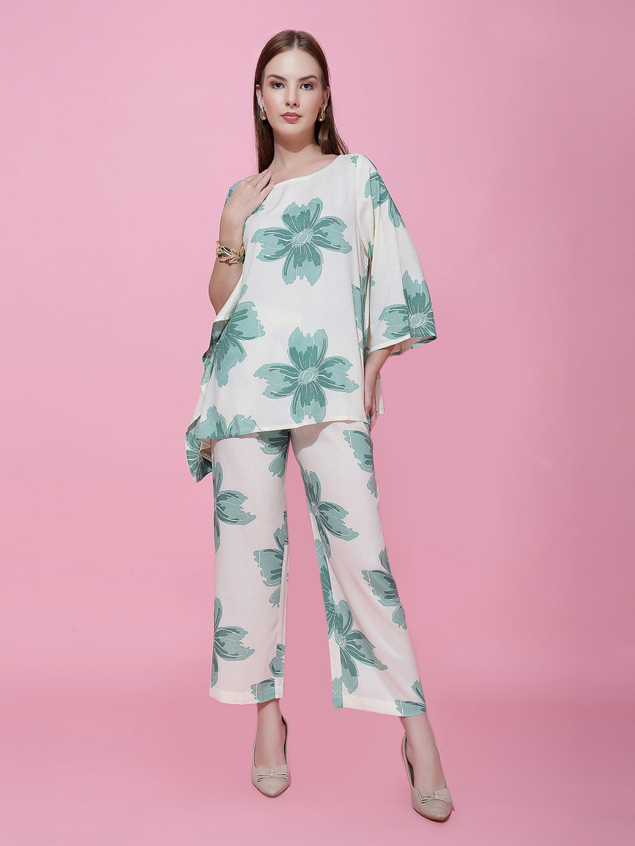 Women's off-white and green floral printed co-ord set with wide-leg pants and asymmetrical top