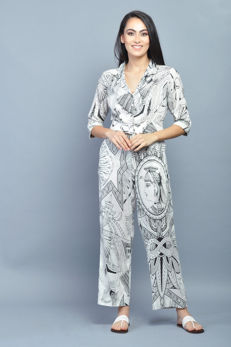 Women’s white printed co-ord set with artistic black sketch design, full sleeves top and straight pants